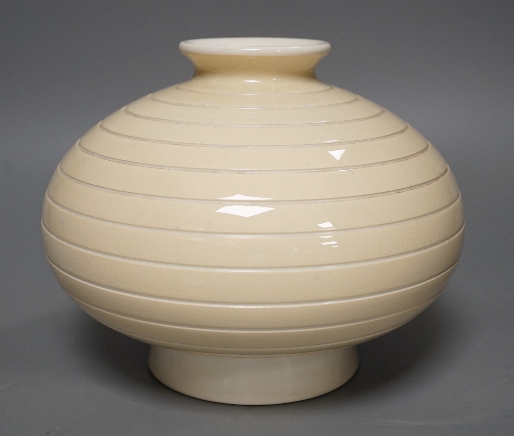 An unusual Keith Murray for Wedgwood buff-glazed vase, 16cm